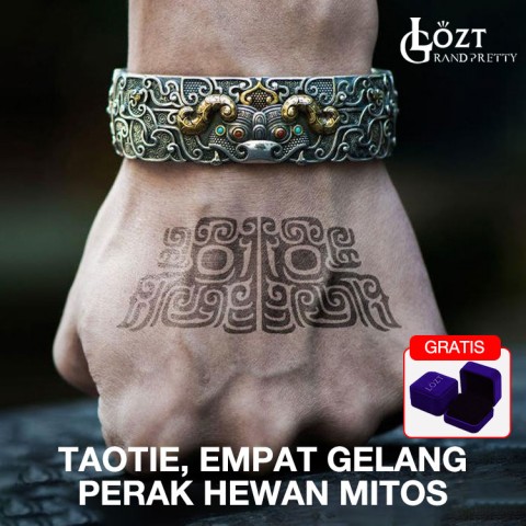 Taotie, empat gelang perak gajah