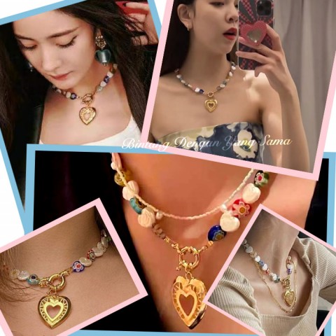 Bintang Korea dengan kalung mutiara cinta kaca bunga yang sama